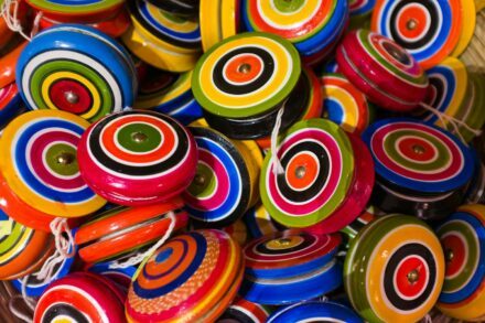 a pile of colorful buttons sitting next to each other